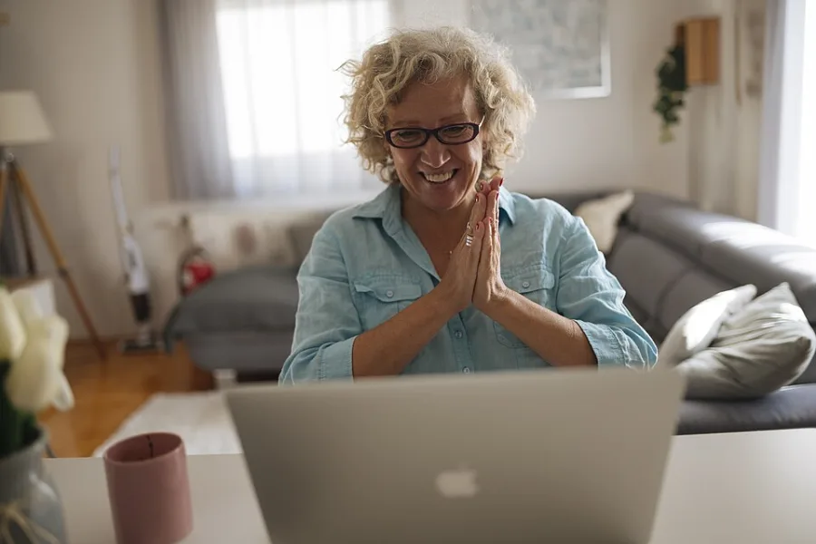 A person working from home on a laptop